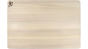 This image shows a collection of eight top-rated cutting boards suitable for Japanese knives.