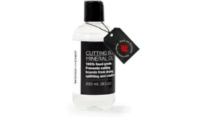 The image shows a selection of seven popular oils ideal for conditioning wooden cutting boards.