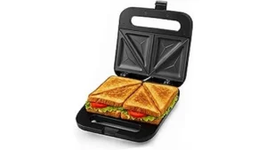 The image shows a sleek, silver Best Selling 8 Sandwich Maker for Home on a kitchen counter.