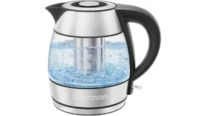 The image shows a modern electric tea kettle with an infuser, perfect for enjoying loose leaf tea.