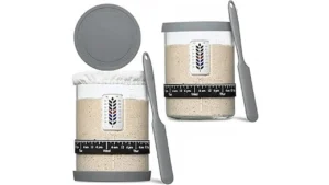 The image shows several clean Mason jars filled with sourdough starter, ideal for a Top Rated 10 list.