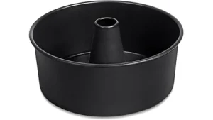 The image shows a golden brown pound cake freshly baked in a featured top-rated 9 cake pan.