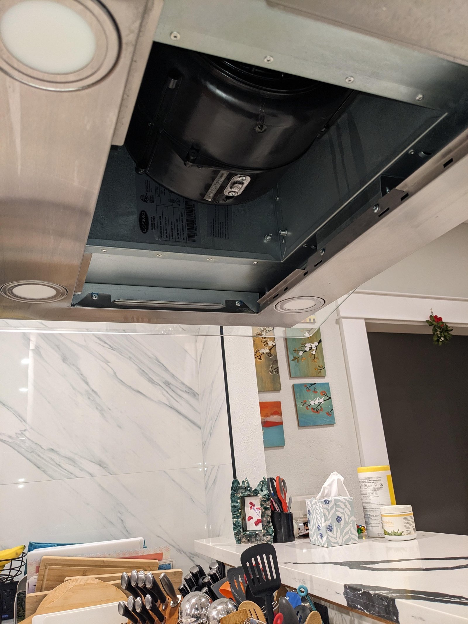 Essential tools and insulation materials for repairing a leaking range hood.